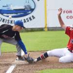 The Post 20 Twins&rsquo; Cody Quelland slides into third base ahead of the botched tag by Palmer&rsquo;s Alasada McKechnie, Sunday at Coral Seymour Memorial Ballpark in Kenai. (Photo by Joey Klecka/Peninsula Clarion)
