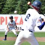 Twins outfielder David Belger keeps an eye on teammate Joe Ravin Wednesday against Post 33 Chugiak at Coral Seymour Memorial Ballpark in Kenai. (Photo by Joey Klecka/Peninsula Clarion)