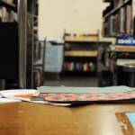 Supplies sit on the desk in the newly finished book sale room in the basement of the Soldotna Public Library on Wednesday, July 12, 2017 in Soldotna, Alaska. (Photo by Elizabeth Earl/Peninsula Clarion)
