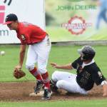 South&rsquo;s Derek McGinnis slides into second base ahead of the tage by Porter Fannon, Saturday at Coral Seymour Memorial Ballpark in Kenai. (Photo by Joey Klecka/Peninsula Clarion)