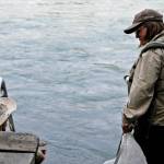 Kathy Heindle (right), a Kenai Peninsula Stream Watch volunteer, speaks to a man on one of the fishing access stairs during one of her Kenai Peninsula Stream Watch walks in Centennial Park on Thursdayin Soldotna. Heindle, who has been volunteering with Stream Watch since 2011, received a &ldquo;Kingmaker&rdquo; award from the Kachemak Heritage Land Trust for her work protecting the Kenai River watershed. (Photo by Elizabeth Earl/Peninsula Clarion)