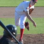 Peninsula Oilers starter Joey Becher sends a pitch to home plate against the Anchorage Bucs in the second game of a doubleheader Friday at Coral Seymour Memorial Ballpark in Kenai. (Photo by Joey Klecka/Peninsula Clarion)
