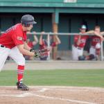 Kenai&rsquo;s Tanner Ussing puts down a bunt during an 11-3 win over the Palmer Pioneers on Friday, July 21, 2017, at Hermon Brothers Field in Palmer. (Photo by Jeremiah Bartz/Frontiersman)