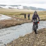 The Roof of the Arctic group bikes along the beach before heading inland to the Lisburne Hills. They had to backtrack after setting up their camp earlier. (Photo courtesy Bj&