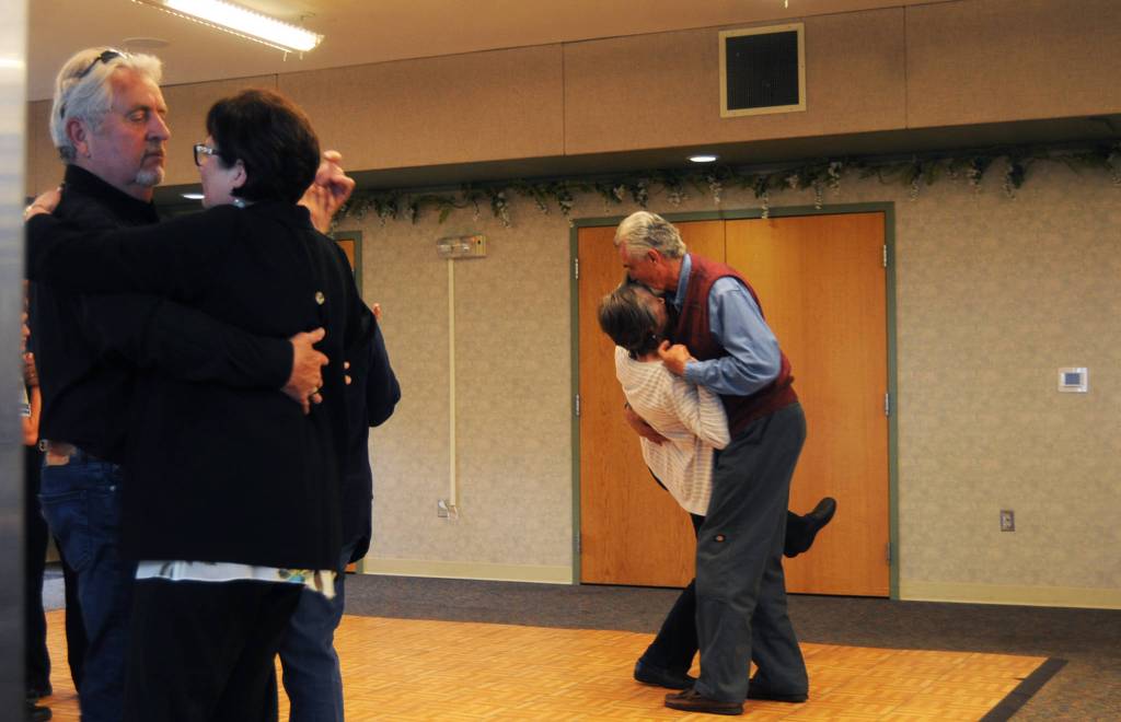 Lopaka Bodnar (right) kisses his wife Mary Bodnar&rsquo;s forehead during a slow dance at the 50th Kenai Central High School Class of 1967 reunion at the Kenai Senior Center on Friday, July 28, 2017 in Kenai, Alaska. The reunion was organized to mark the &lsquo;67 graduating class&rsquo;s reunion, though classes from the &rsquo;60s, &rsquo;50s and the days of the Territorial School before that were also welcome.
