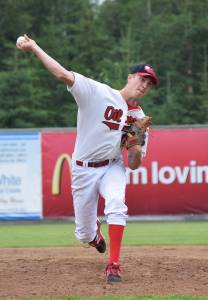 Peninsula Oilers starter Joey Becher delivers a pitch to a Chugiak Chinooks batter Friday at Coral Seymour Memorial Ballpark in Kenai. (Photo by Joey Klecka/Peninsula Clarion)