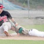 Mat-Su Miners infielder Austin Dennis steals third base, sliding into the bag behind Peninsula third baseman Nathan Webb during a 2-1 win over the Oilers on Thursday afternoon at Hermon Brothers Field in Palmer. With the win, the Miners swept the best-of-three first-round series and move into the Alaska Baseball League Top of the World Series, which starts Friday at 6 p.m. at Hermon Brothers Field. (Photo by Jeremiah Bartz/Frontiersman)