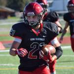 Kenai Central running back Zack Tuttle looks for an opening Sept. 10, 2016, against Kodiak at Ed Hollier Field in Kenai. (Photo by Joey Klecka/Peninsula Clarion)
