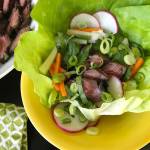 This July photo shows Korean-style grilled short ribs in New York. In general, short ribs have to be cooked either low and slow, or very quickly over high heat so that they don&rsquo;t become tough. This recipe calls for almost flash grilling, just 3 or 4 minutes on each side. (Katie Workman via AP)