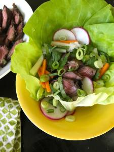 This July photo shows Korean-style grilled short ribs in New York. In general, short ribs have to be cooked either low and slow, or very quickly over high heat so that they don&rsquo;t become tough. This recipe calls for almost flash grilling, just 3 or 4 minutes on each side. (Katie Workman via AP)