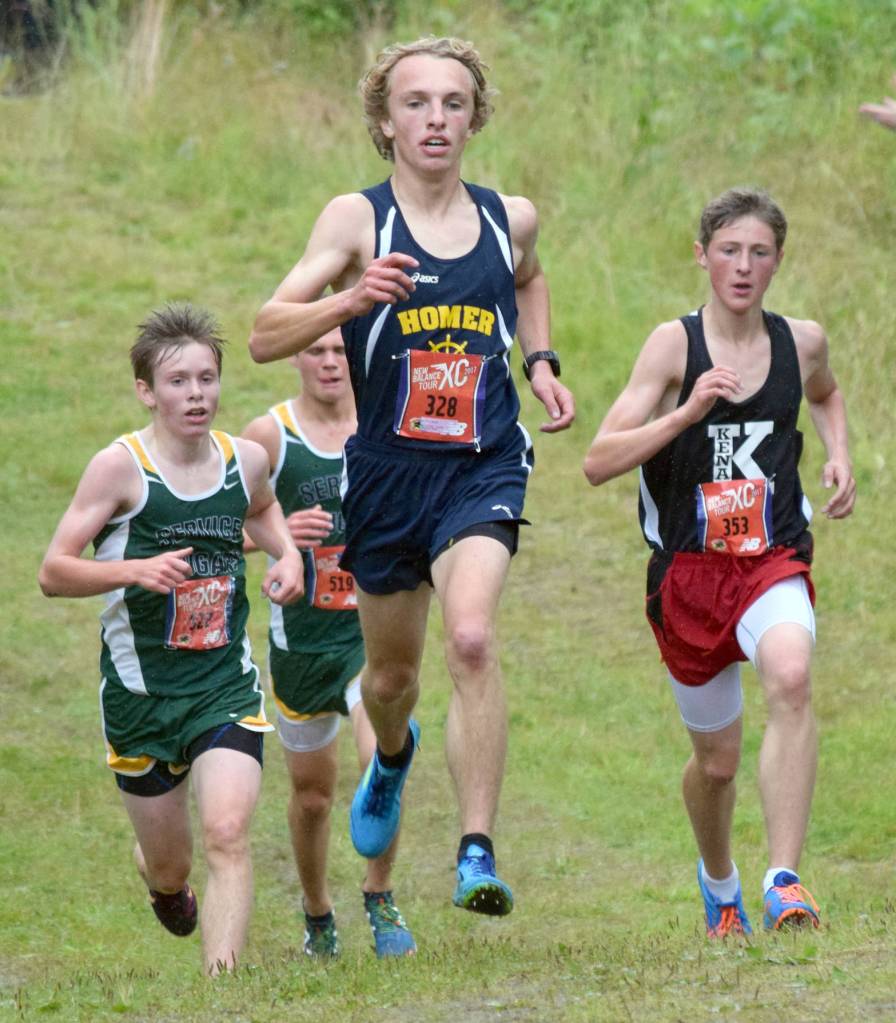 1120;position themselves in the front of the pack at the start of the girls race Saturday, Aug. 19, 2017, at the Tsalteshi Invitational. (Photo by Jeff Helminiak/Peninsula Clarion)