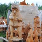Eric Berson&rsquo;s chainsaw carvings stand tall, waiting for the finishing touches at his shop in Sterling.