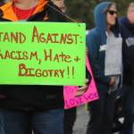Community members gather in Soldotna Creek Park on Wednesday, August 16 in memorium of Heather Heyer, the woman killed during protests in Charlottesville, Virginia earlier this month. Organizers of the memorial walk have decided to continue the event for the next two weeks. (Photo by Kat Sorensen/Peninsula Clarion)