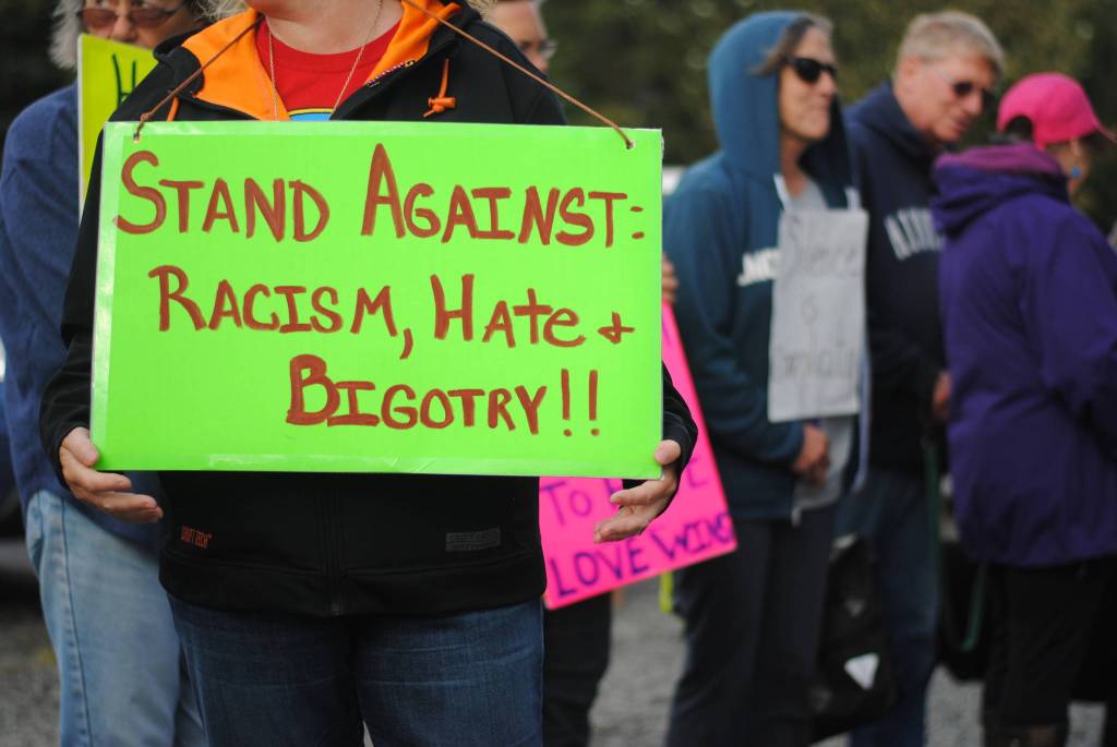 Community members gather in Soldotna Creek Park on Wednesday, August 16 in memorium of Heather Heyer, the woman killed during protests in Charlottesville, Virginia earlier this month. Organizers of the memorial walk have decided to continue the event for the next two weeks. (Photo by Kat Sorensen/Peninsula Clarion)