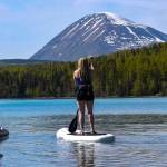 Stand-up paddle boarders explore the waterways of the Kenai Peninsula with Courtney Larsen&rsquo;s Adventure Guru. (Photo courtesy of Courtney Larsen)