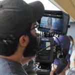 In an Aug. 9, 2017 photo, director of photography Michael Bergstrom films a scene from &ldquo;Telltale,&rdquo; featuring actress Carly Jones in Eagle River, Alaska. The film is one of two independent movies produced by Alaska filmmaker Charles Baird that were filmed in Eagle River the summer of 2017. (Kirsten Swann/Chugiak-Eagle River Star via AP)