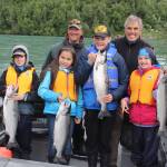 Pinch-hitting for his wife Sen. Lisa Murkowski, Vern Martell welcomes successful fisherkids ashore at KRSA Junior Classic.