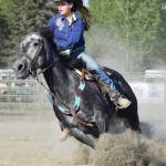 Katy Jones guides her horse in the right direction in the barrel racing event June 3 at the Soldotna Rodeo Series at the Soldotna Rodeo Grounds. Photo by Joey Klecka/Peninsula Clarion