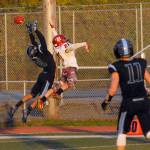 Chugiak defensive back Ramal Maad, left, and Kenai Central wide receiver Zack Tuttle go up for a pass during Chugiak&rsquo;s 48-0 nonconference high school football win over Kenai on Friday, Sept. 15, 2017 at Tom Huffer Sr. Stadium in Chugiak. (Star photo by Matt Tunseth)