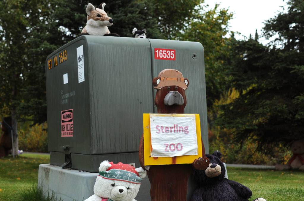 A group of teddy bears, a stuffed fox and a toy husky greet visitors to the Sterling Transfer Site on Saturday, Sept. 16, 2017 near Sterling, Alaska. The attendants at the transfer site, where trash is picked up and taken to Central Peninsula Landfill, rescue stuffed animals from the trash and giving them new life in the &ldquo;Sterling Zoo,&rdquo; where they rest in the bushes and trees surrouding the transfer site to greet visitors throughout the summer. They go into &ldquo;hibernation&rdquo; in the winter, resting on a shelf to stay dry before reappearing the following summer. (Photo by Elizabeth Earl/Peninsula Clarion)