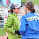 Saundra Hudson, an active member of and advocator for the Homer running community and teacher at Homer High School, talks with Cross-Country Coach Annie Ridgley after completing the Mariner Mile, a new event held Thursday, Sept. 14, 2017 at the high school track in Homer, Alaska. Hudson, who was a heavy advocator for the school&rsquo;s track to be put in, experienced a head injury when she slipped on the ice running this past March, and Thursday&rsquo;s fundraising event for the Kachemak Bay Running Club was the first time she&rsquo;s run in six months. (Photo by Megan Pacer/Homer News)