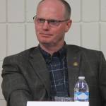 Brent Hibbert, left, listens while fellow candidate Dan Castimore answers a question during a forum for Kenai Peninsula Borough Assembly candidates at a joint meeting of the Kenai and Soldotna Chambers of Commerce on Wednesday, Sept. 13, 2017 in Soldotna, Alaska. Hibbert and Castimore are running for the District 1-Kalifornsky seat. (Photo by Will Morrow/Peninsula Clarion)