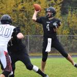 Nikiski sophomore Michael Eiter delivers a pass against the Eielson rush Friday evening at Nikiski High School. (Photo by Joey Klecka/Peninsula Clarion)