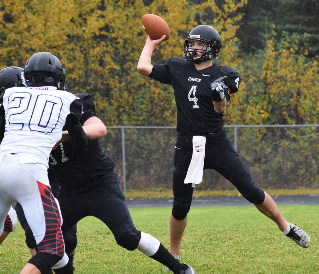 Nikiski sophomore Michael Eiter delivers a pass against the Eielson rush Friday evening at Nikiski High School. (Photo by Joey Klecka/Peninsula Clarion)