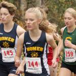 Homer&rsquo;s Alex Moseley and Brooke Miller and Seward&rsquo;s Ruby LIndquist jockey for position in the Division II girls race at the Region III Championshps on Saturday, Sept. 23, 2017, at the Government Peak Recreation Area. (Photo by Jeremiah Bartz/Frontiersman)