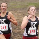 Kenai Central&rsquo;s Riana Boonstra follows right behind teammate Addison Gibson during the final meters of the Division I girls&rsquo; race of the Region III Championships Saturday, Sept. 23, 2017, at the Government Peak Recreation Area near Palmer. Gibson held on to win the region title. Kenai also won the girls&rsquo; team title.