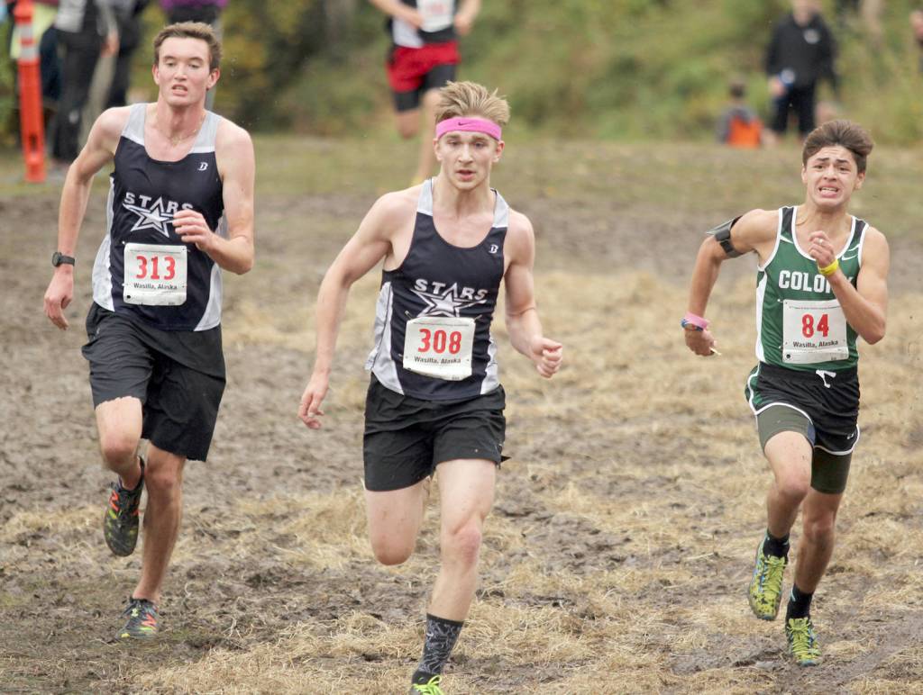 Soldotna&rsquo;s John-Mark Pothast and Bechler Metcalf race for the finish at the Region III Championships at the Government Peak Recreation Area near Palmer on Saturday, Sept. 23, 2017. (Photo by Jeremiah Bartz/Frontiersman)