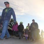 As the sun rises, students and their parents walk to school along Redoubt Avenue in Soldotna.