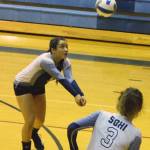 Soldotna setter Shaylynn Zener sets up a pass for teammate Ella Stenga Tuesday night against Seward at Soldotna High School. (Photo by Joey Klecka/Peninsula Clarion)