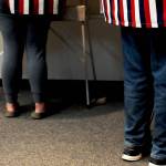 Voters stand in privacy booths inside Soldotna City Hall on Tuesday, Oct. 3, 2017 in Soldotna, Alaska. (Photo by Elizabeth Earl/Peninsula Clarion)