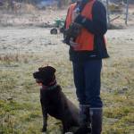 Mason St. Onge holds his recently shot chukar during Safari Club International&rsquo;s bird hunt on Saturday, Oct. 7, 2017 in Funny River, Alaska. St. Onge had been moose and deer hunting, but Saturday was his first experience bird hunting. (Photo by Kat Sorensen/Peninsula Clarion)