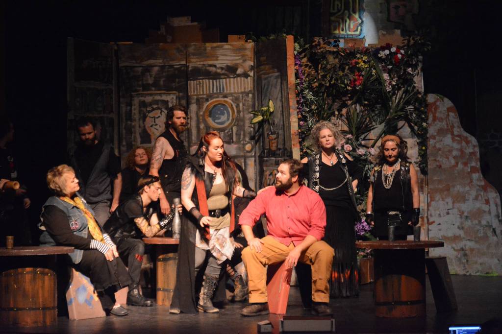 Curtis Jackson, left, as Judas, Hannah Heimbuch, center, as Mary Magdalene, and Kyle Schneider, right, as Jesus, rehearse a scene from &ldquo;Jesus Christ Superstar&rdquo; on Oct. 2 at the Mariner Theatre in Homer. The musical runs through this weekend. (Photo by Michael Armstrong, Homer News)