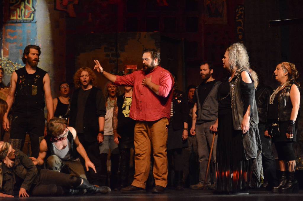 Kyle Schneider, center, as Jesus, rehearses a scene from &ldquo;Jesus Christ Superstar&rdquo; on Monday, Oct. 2, 2017 at the Mariner Theatre in Homer, Alaska. The musical opens Friday, Oct. 6. (Photo by Michael Armstrong, Homer News)