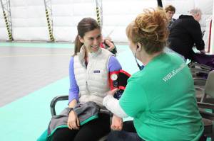 Homer resident Jackie Kondak has her blood pressure taken by Meredith Morphew, a registered nurse at South Peninsula Hospital, during Homer&rsquo;s inaugural Walk with a Doc event Saturday, Oct. 7, 2017 at the newly completed South Peninsula Athletic and Recreation Center in Homer, Alaska. (Photo by Megan Pacer/Homer News)