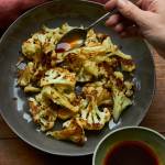 This Jan. 27 photo shows roasted cauliflower with a sesame drizzle in New York. This dish is from a recipe by Katie Workman. (Mia via AP)