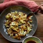 This Jan. 27 photo shows roasted cauliflower with a sesame drizzle in New York. This dish is from a recipe by Katie Workman. (Mia via AP)