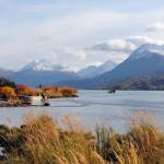 A boat is tethered to the shore of Skilak Lake on the Kenai Peninsula in Alaska on Oct. 11, 2017 during a fly fishing trip. (Photo by Kat Sorensen/Peninsula Clarion)