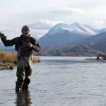 Mike Tuhy, owner and operator of the Tower Rock Lodge in Kenai, Alaska, casts for trout in the Upper River Kenai on Oct. 11, 2017. (Photo by Kat Sorensen/Peninsula Clarion)