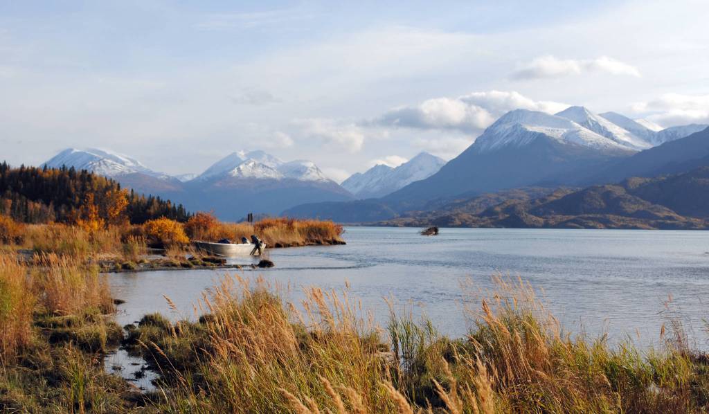 A boat is tethered to the shore of Skilak Lake on Oct. 11 during a fly fishing trip. (Photo by Kat Sorensen/Peninsula Clarion)