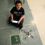 Daniel Herndon, a eighth-grader from Ninilchik, starts an obstacle course with his drone at the Upstream Academy at the Challenger Center in Kenai on Thursday. The course was the culminating activity for the drone lessons throughout the week long camp for Alaska Native education students and migrant students from the district. &ldquo;This is our second Upstream,&rdquo; said Conrad Woodhead, the Native Education Program Coordinator with the Kenai Peninsula Borough School District. &ldquo;This time we&rsquo;ve invited two different groups of students&
