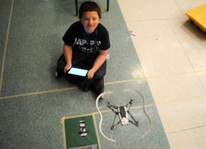 Daniel Herndon, a eighth-grader from Ninilchik, starts an obstacle course with his drone at the Upstream Academy at the Challenger Center in Kenai on Thursday. The course was the culminating activity for the drone lessons throughout the week long camp for Alaska Native education students and migrant students from the district. &ldquo;This is our second Upstream,&rdquo; said Conrad Woodhead, the Native Education Program Coordinator with the Kenai Peninsula Borough School District. &ldquo;This time we&rsquo;ve invited two different groups of students&