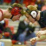 Kenai Central&rsquo;s Kaden McKibben and Soldotna&rsquo;s Sean Babitt size each other up at 170 pounds Thursday, Nov. 9, 2017, at Kenai Central High School. Babitt won by pin. (Photo by Jeff Helminiak/Peninsula Clarion)