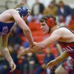 Soldotna&rsquo;s Hudson Metcalf and Kenai Central&rsquo;s John Grossl wrestle at 182 pounds Thursday, Nov. 9, 2017, at Kenai Central High School. Metcalf would pin Grossl. (Photo by Jeff Helminiak/Peninsula Clarion)