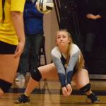 Soldotna junior Brittani Blossom digs a ball Thursday against Bartlett at the Class 4A state volleyball tournament at West High School. (Photo by Joey Klecka/Peninsula Clarion)