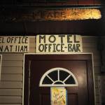 Handmade signs greet visitors at the entrance to the bar at The Place Bar and Motel on Wednesday, Nov. 8, 2017 near Nikiski, Alaska. Owners Grant and Rossana Gratrix recently bought The Place from Jason Young, who took over ownership after his father, John &ldquo;Grizz&rdquo; Young, died in 2015. (Photo by Elizabeth Earl/Peninsula Clarion)