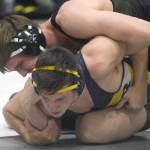 Colony&rsquo;s Caleb Hopkins controls Homer&rsquo;s Tristen Cook at 182 pounds en route to a 2-1 decision Saturday, Nov. 11, 2017, in the championship dual of the Peninsula Duals at Nikiski High School. (Photo by Jeff Helminiak/Peninsula Clarion)